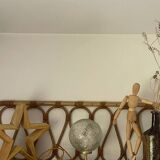 Small handcrafted globe lamp with a cracked finish and a golden brass base.