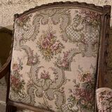 Pair of antique carved wooden armchairs