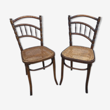 Paires de chaises de bistrot avec assises cannées