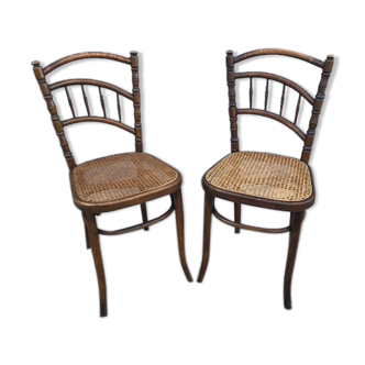 Pair of bistro chairs with cannese seats