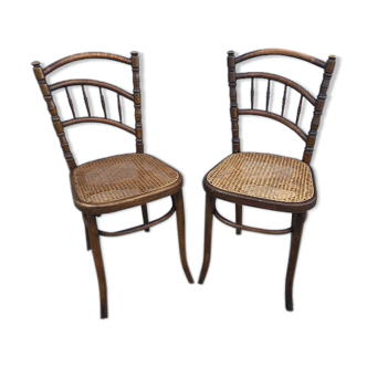 Paires de chaises de bistrot avec assises cannées