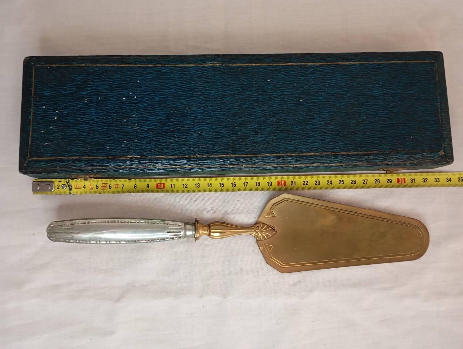 Brass and silver pie server