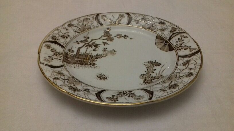 Set of 11 plates and 11 earthenware cups