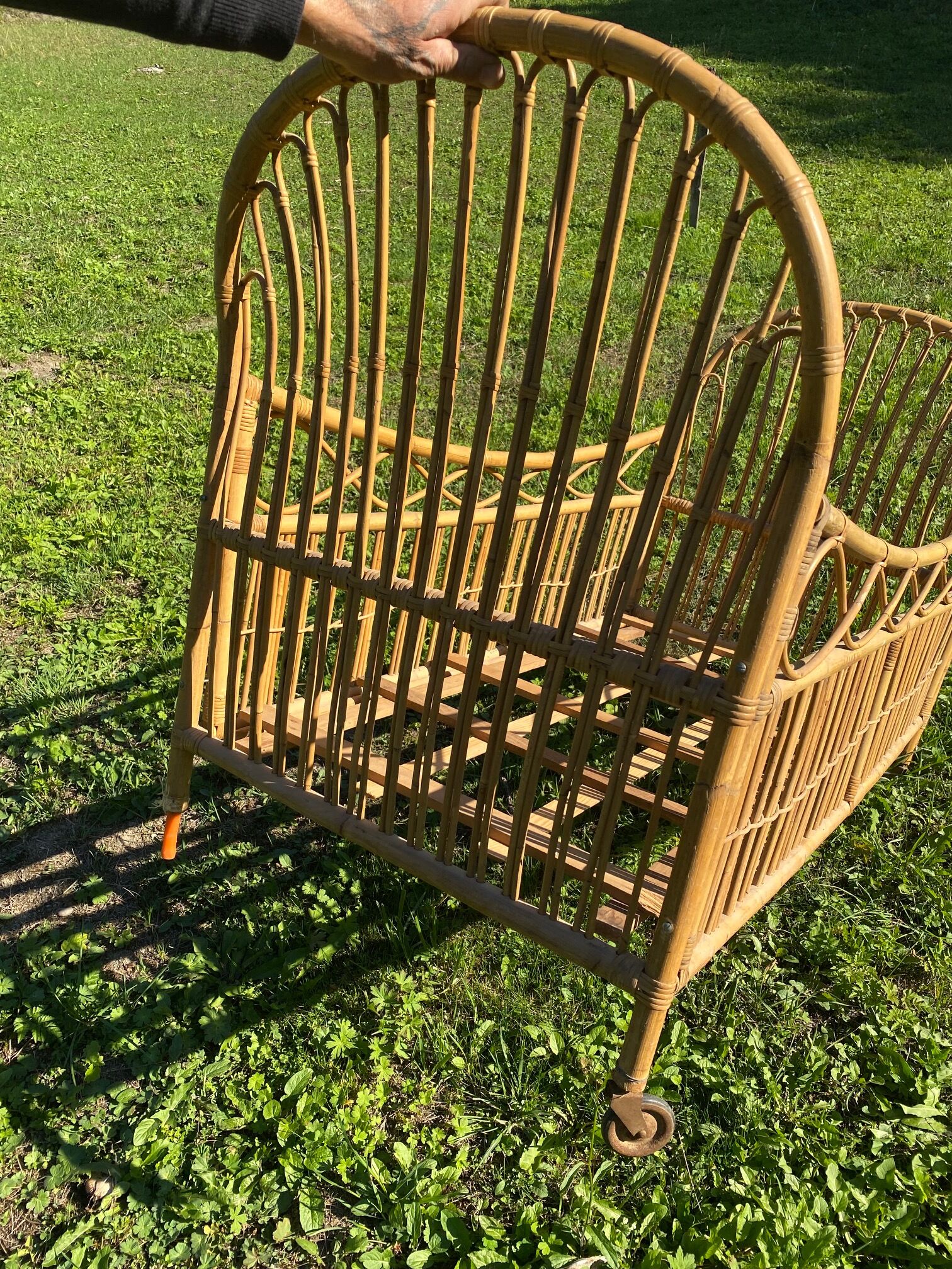 Children's bed in vintage rattan