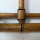 Wall-mounted coat rack made of turned wood