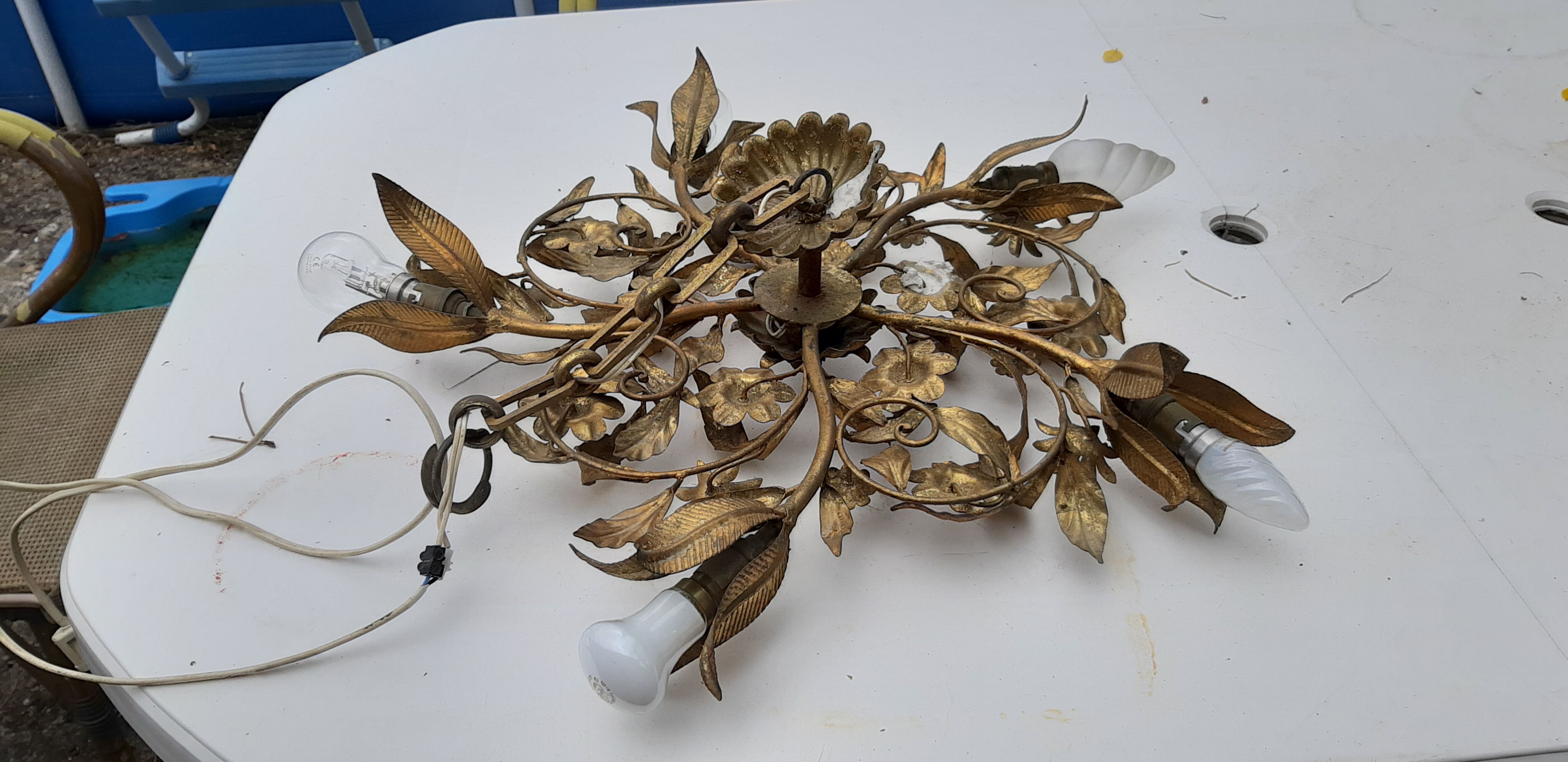 Vintage chandelier in gilded metal