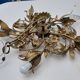 Vintage chandelier in gilded metal