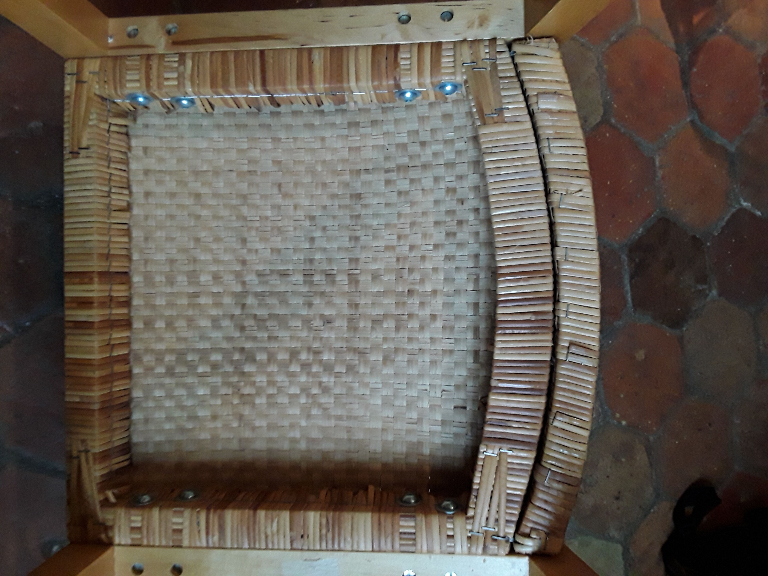 Two vintage braided straw armchairs