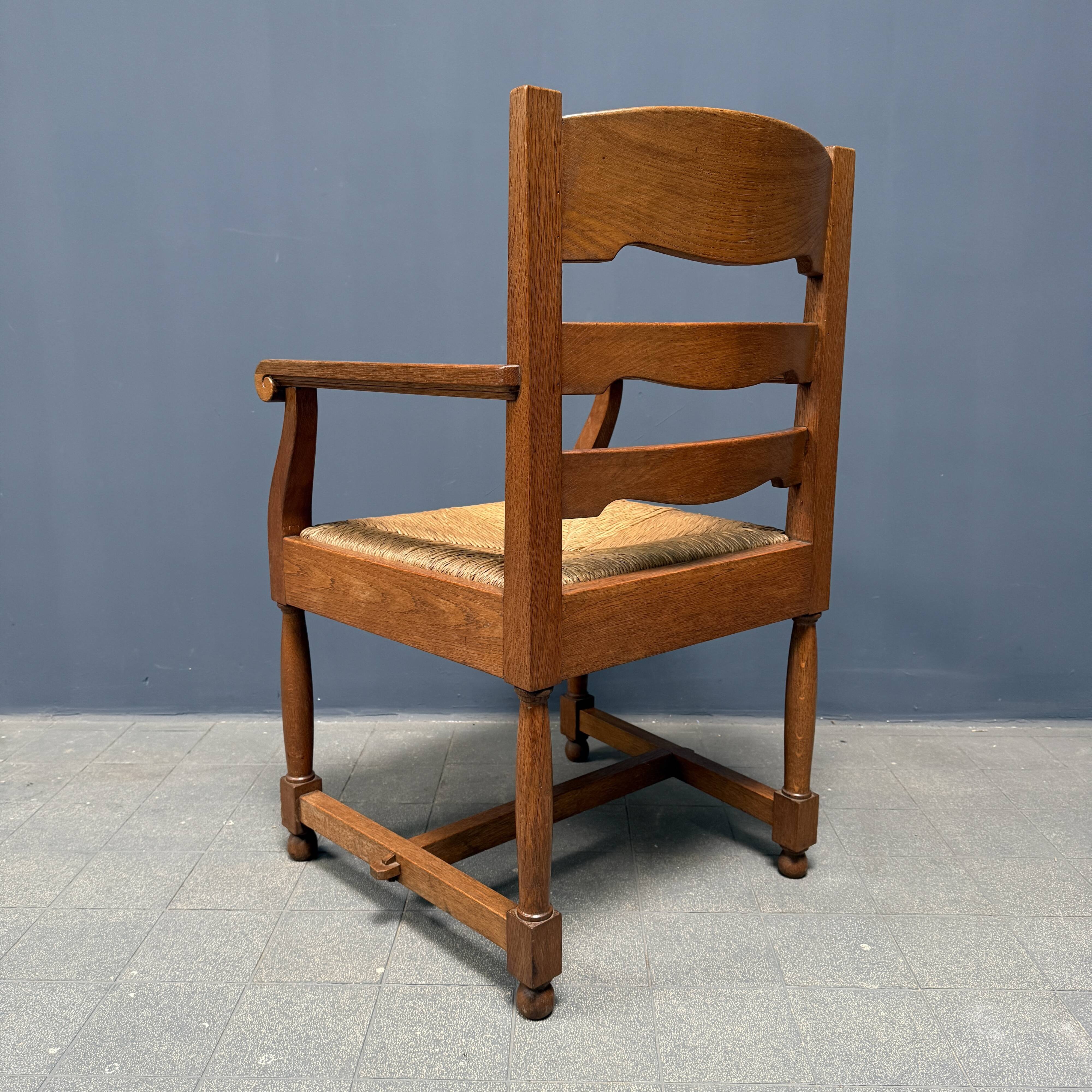 Set of two Dutch oak armchairs with rush seats