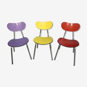 3 colored formica chairs
