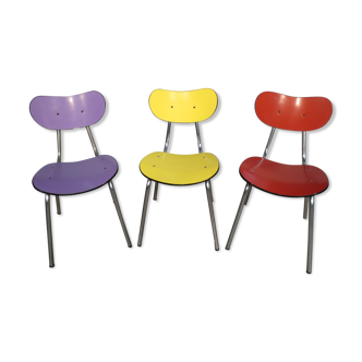 3 colored formica chairs