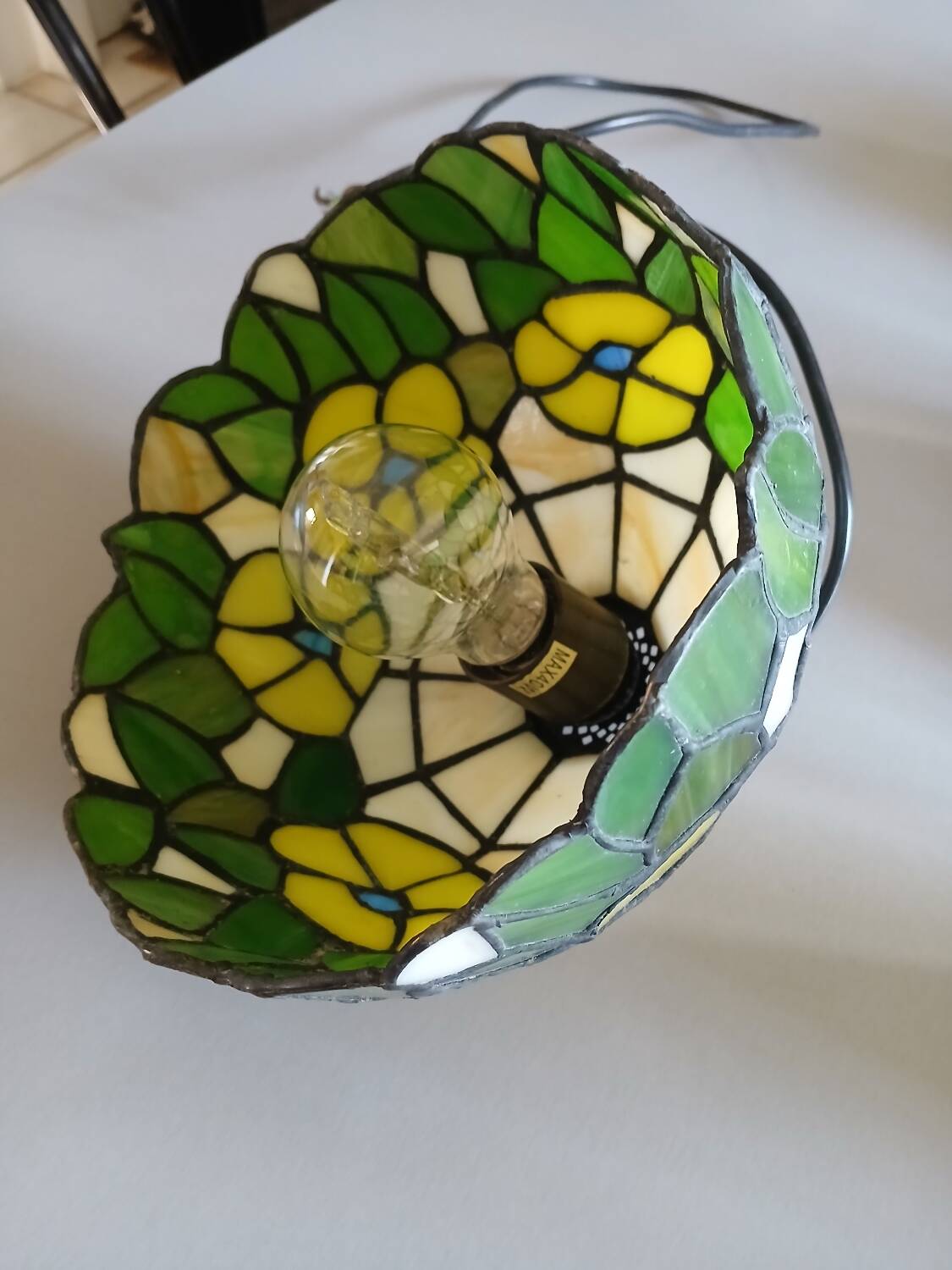 Antique stained glass and tin pendant light