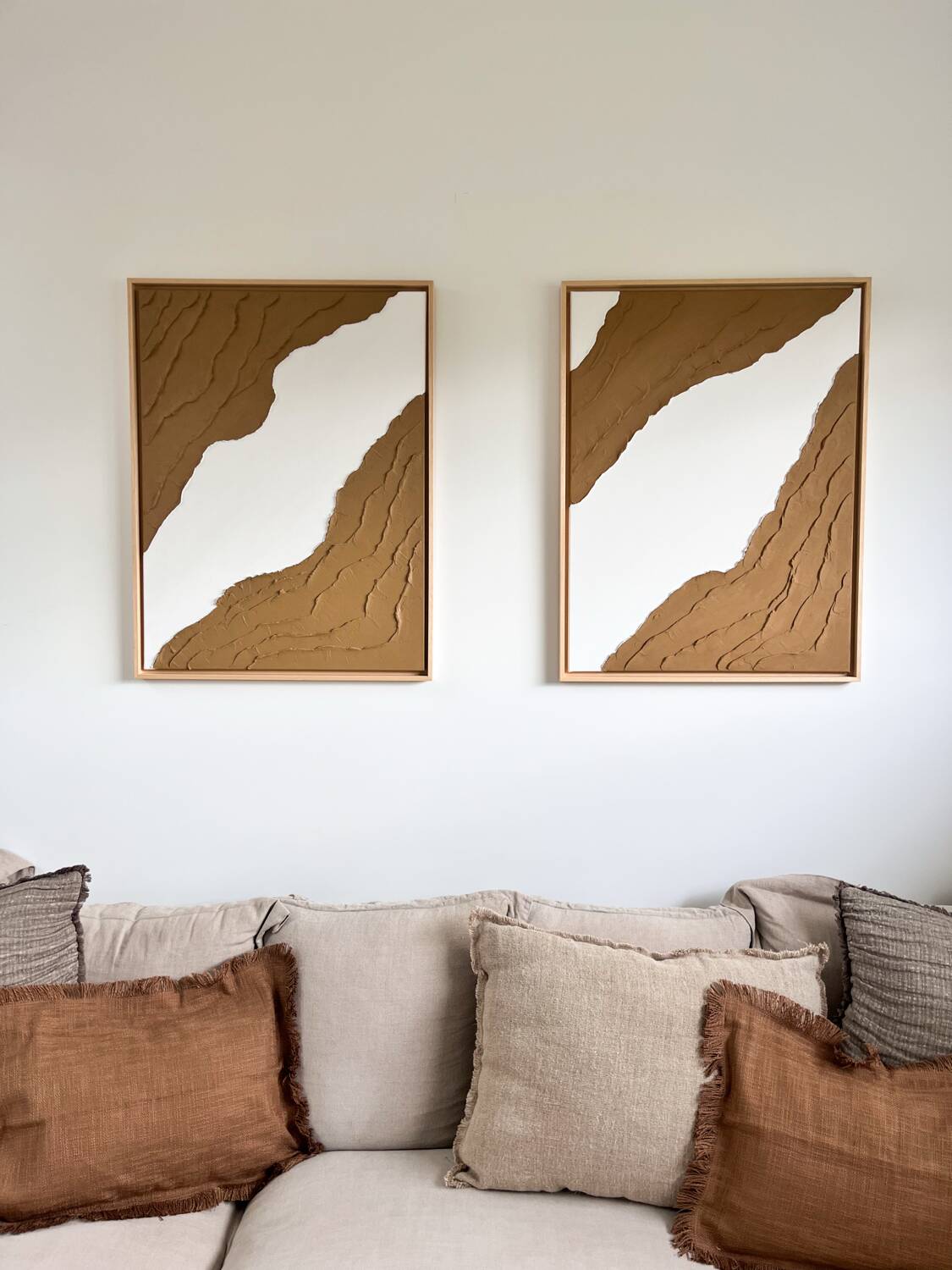 Brown and white relief diptych panels