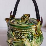 Set of old teapots and honey pot