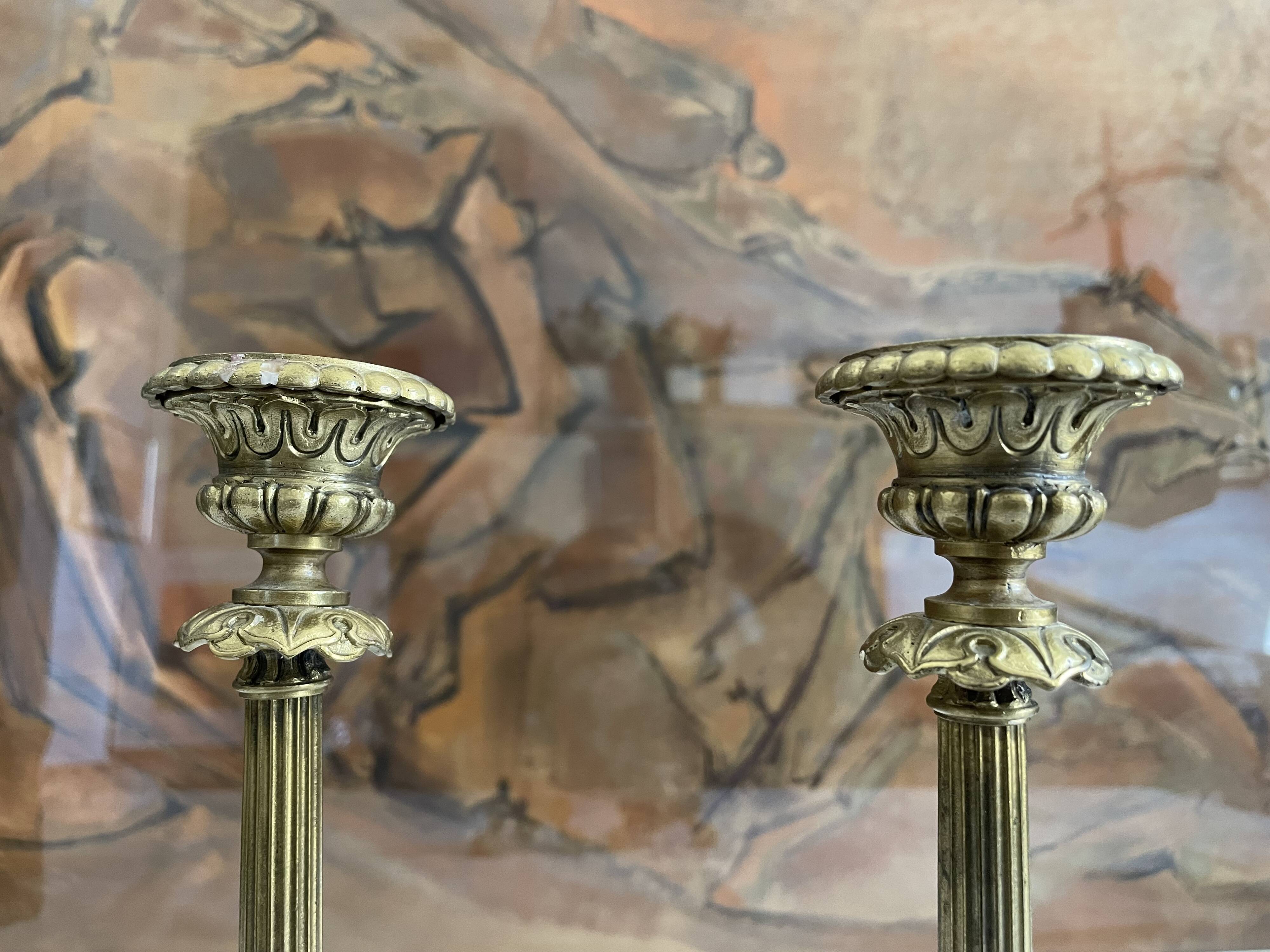 Pair of bronze candle holders