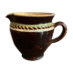 Antique pottery milk jug