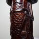Asian statuette, popular art in carved monoxyle wood, vintage 1930-1960.