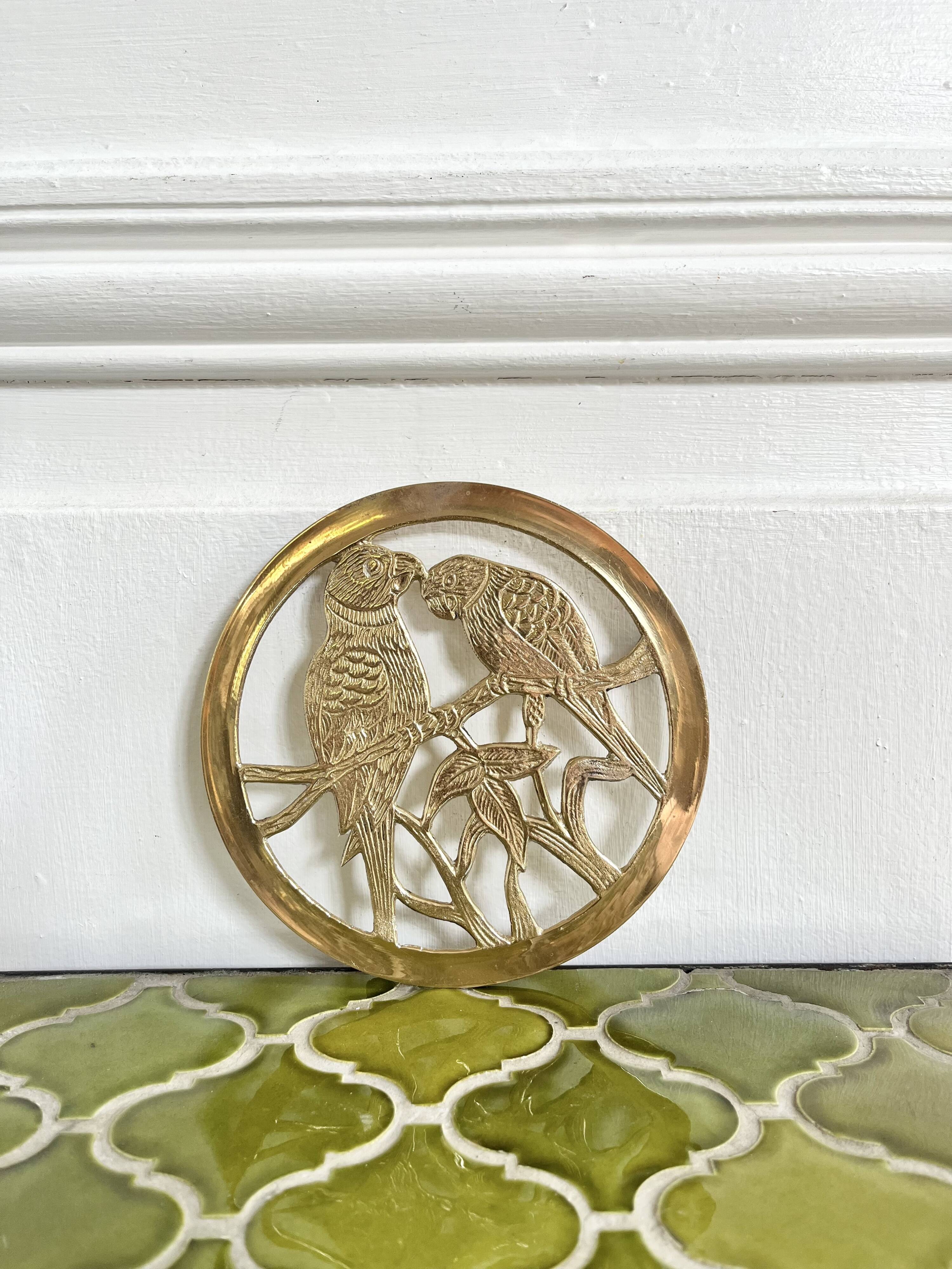 Small brass trivet with parrots or inseparable birds