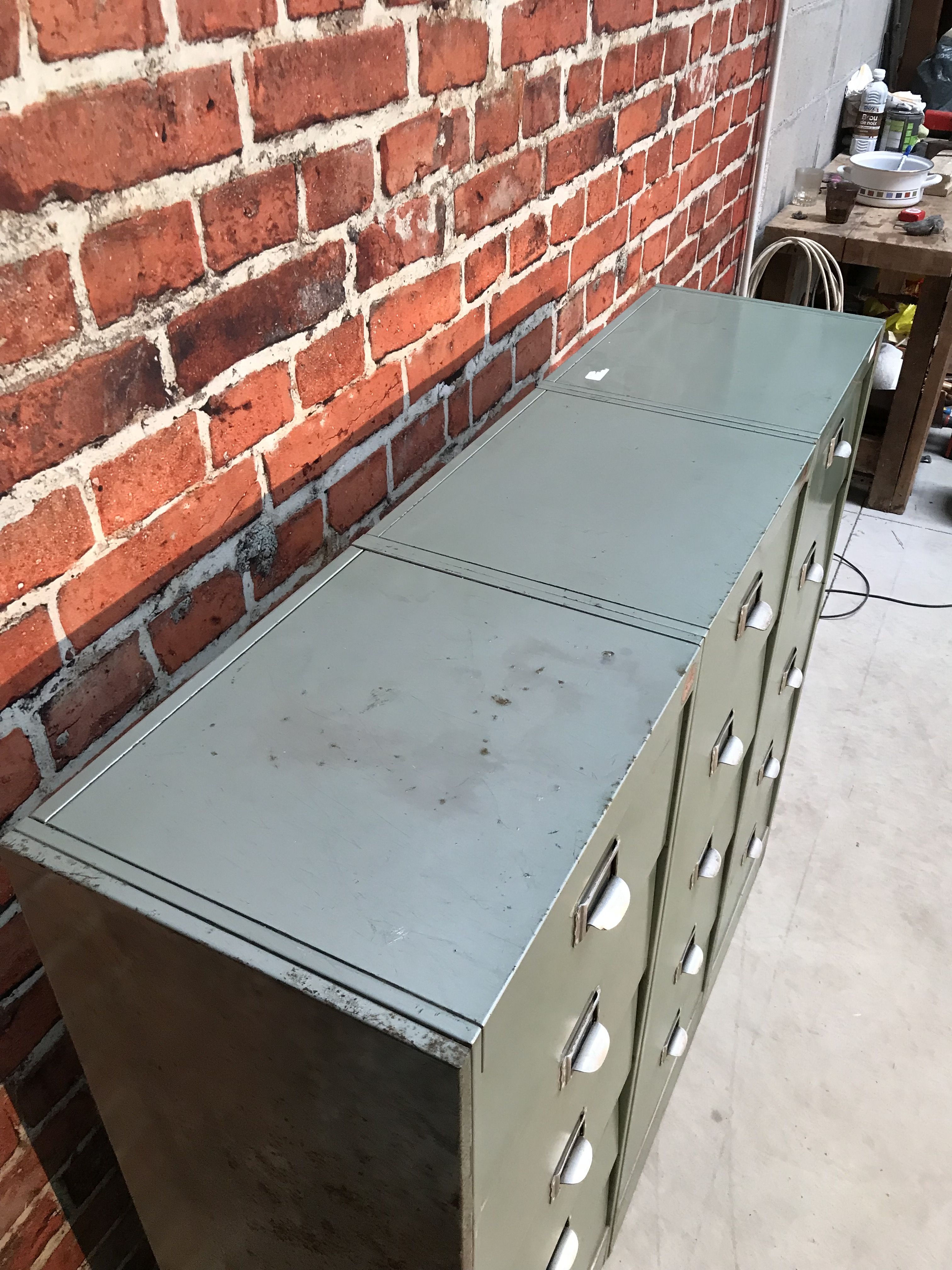 Vintage industrial furniture with metal clamshell atal
