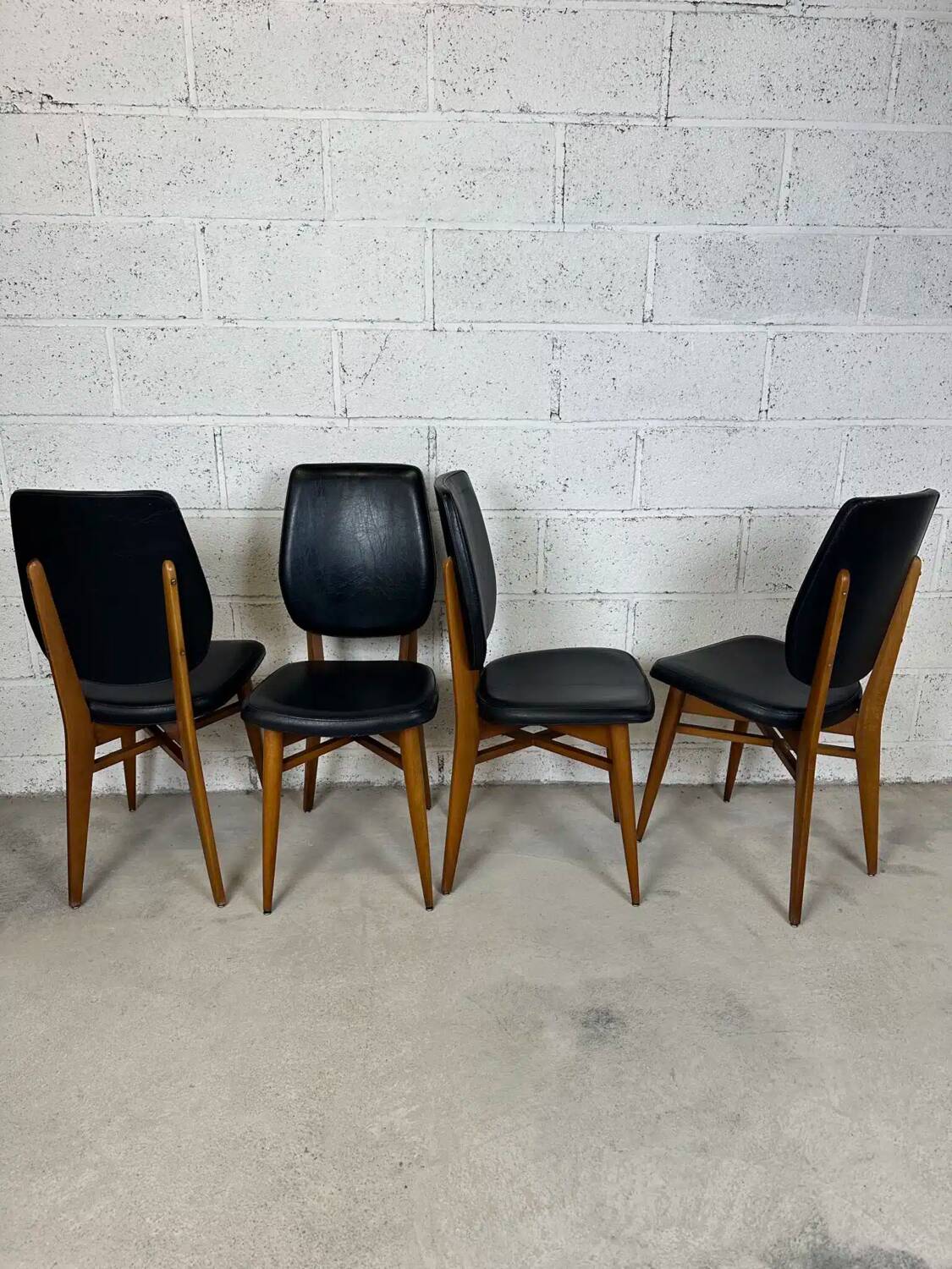 Set of 4 vintage chairs in black leatherette