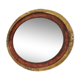 Golden oval art deco mirror
