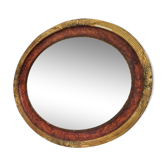 Golden oval art deco mirror