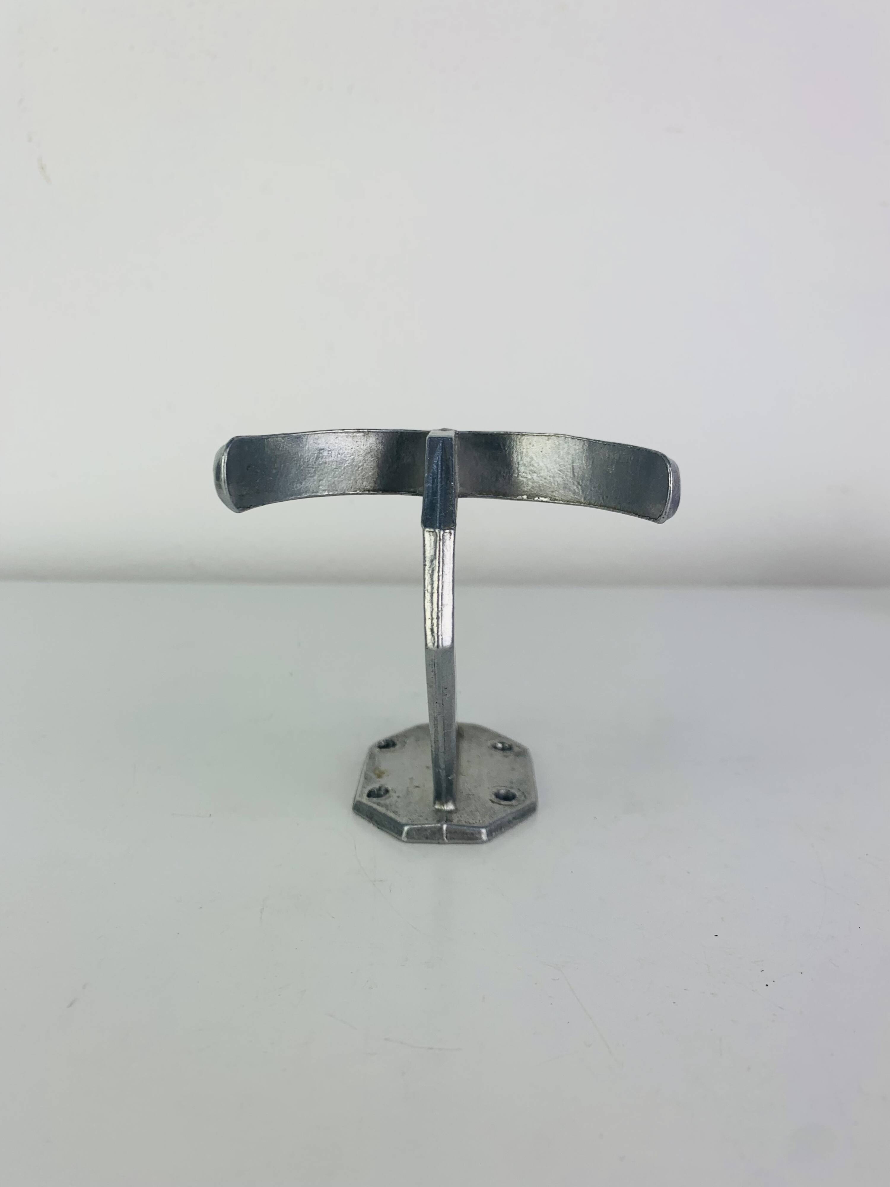 4 wall hooks in aluminium, 1950s