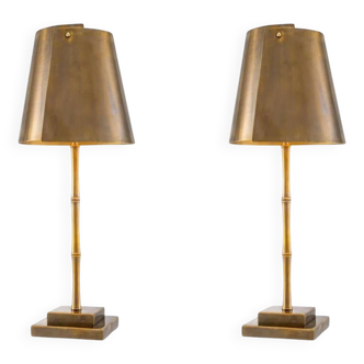 Pair of patinated brass table lamps with bamboo decoration.