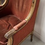 Two Louis XVI style wing chairs in gilded wood, 20th century