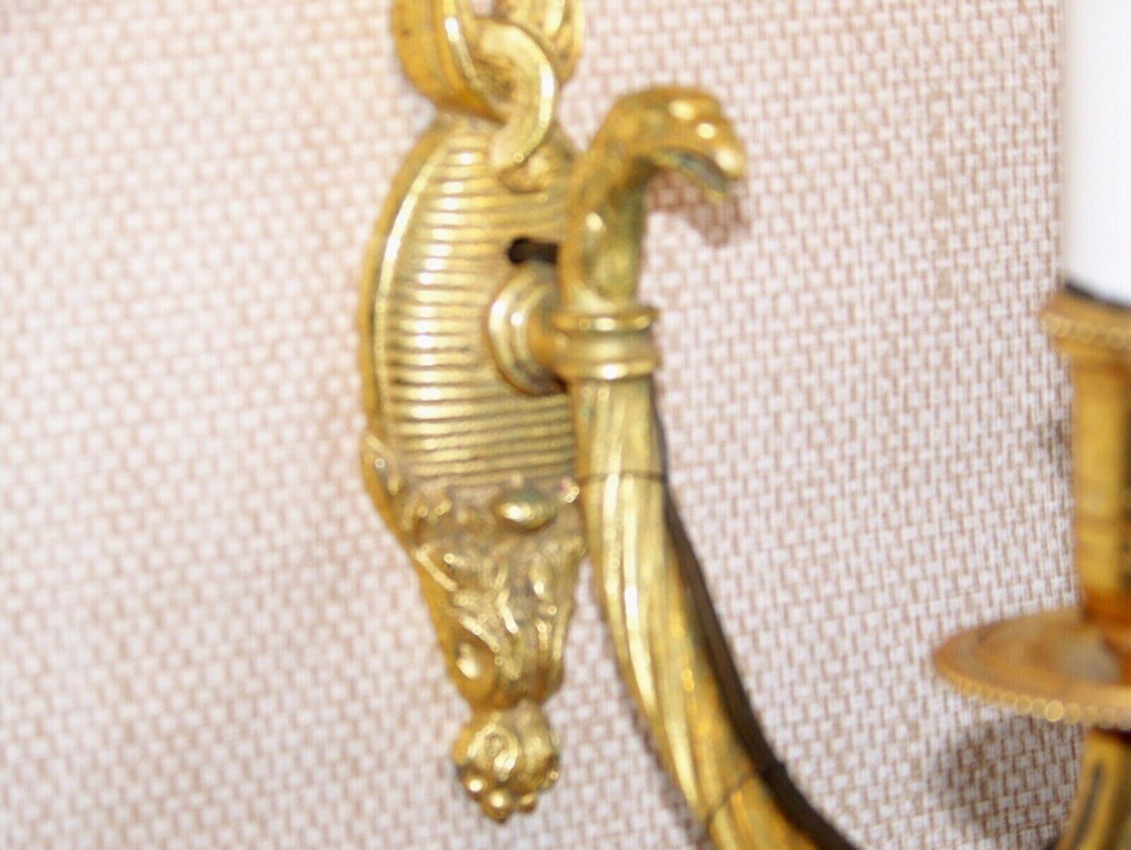 Simple wall sconce in classic Empire style made of vintage French cast brass 4316.