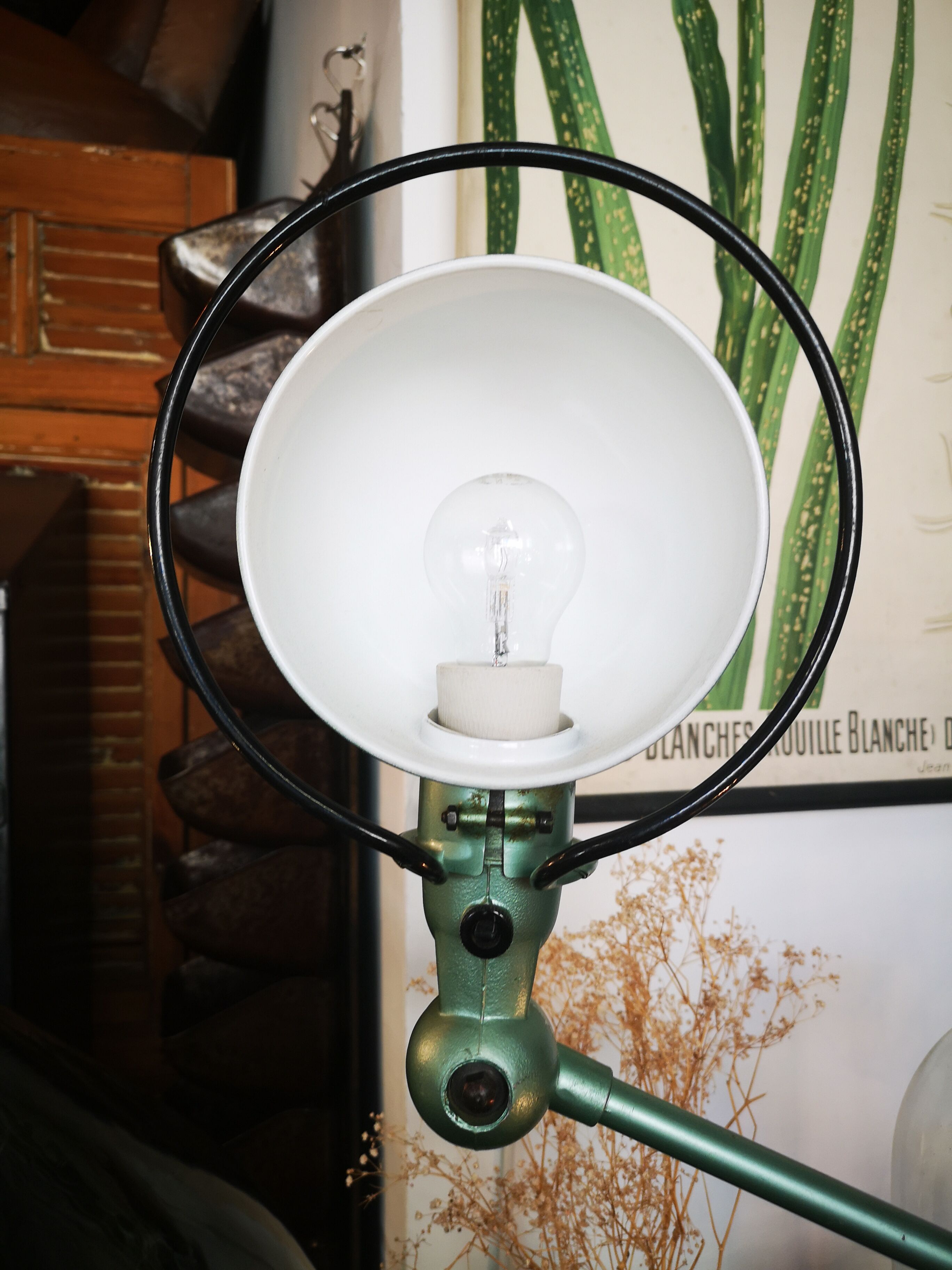 Old green metallic Jieldé lamp