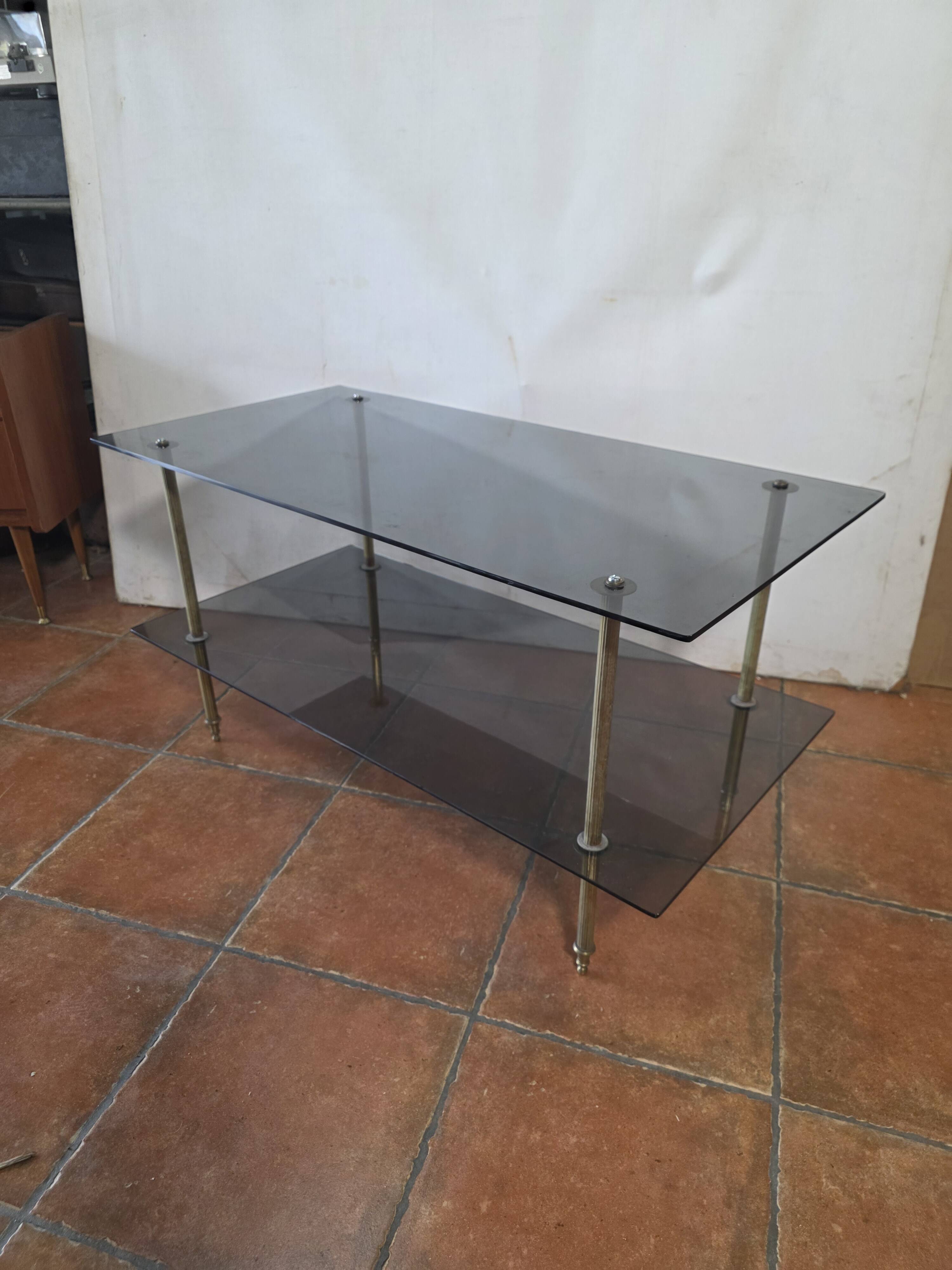 Smoked glass and brass coffee table from the 1970s.