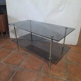 Smoked glass and brass coffee table from the 1970s.