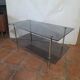 Smoked glass and brass coffee table from the 1970s.