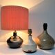 Three vintage ceramic lamps in blue, white and suede