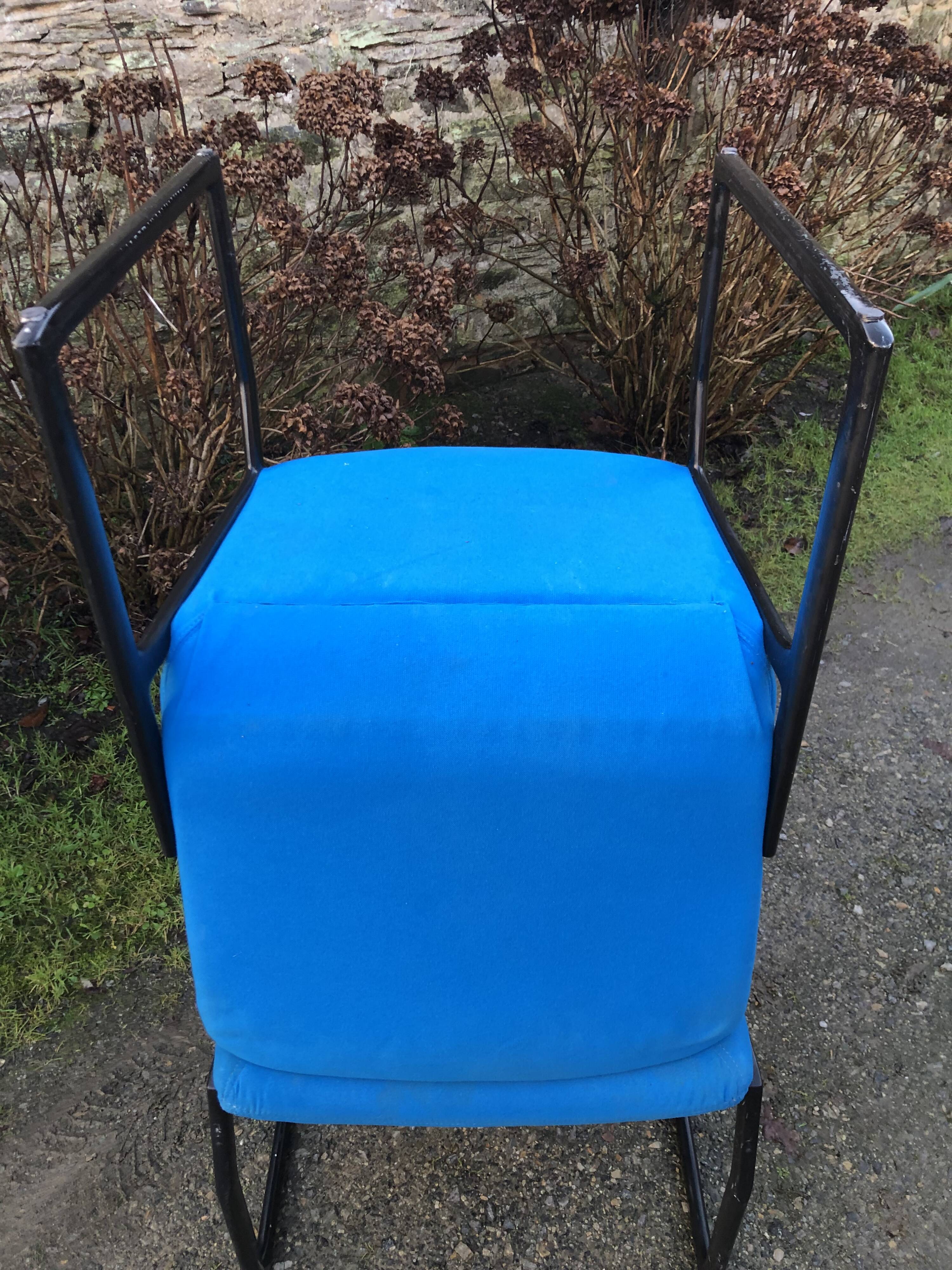 Electric blue fabric designer armchairs with black lacquered metal legs from the 80s.