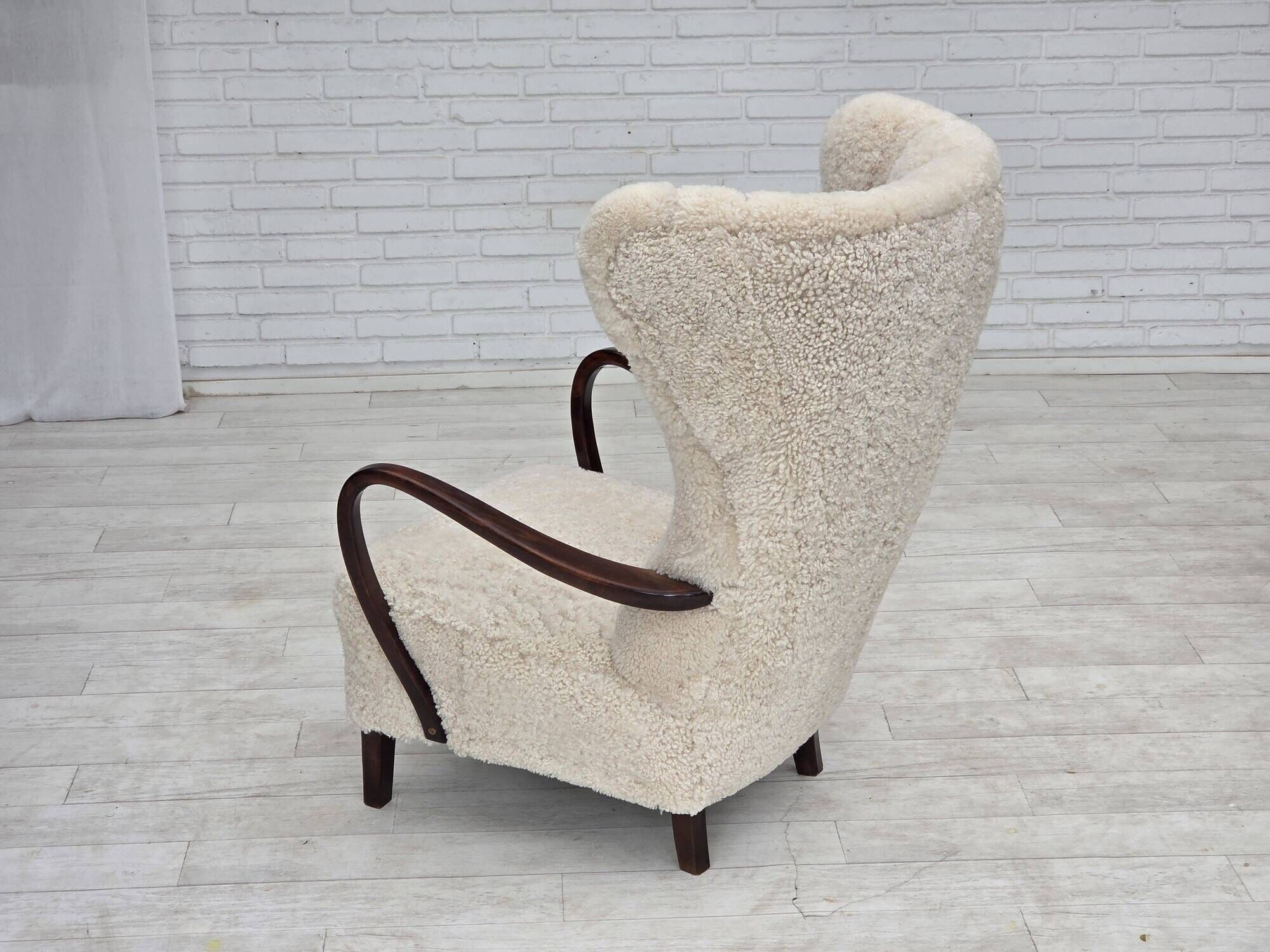 1960s, Danish high-back armchair, genuine sheepskin, reupholstered.