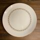Porcelain plates with gold motifs
