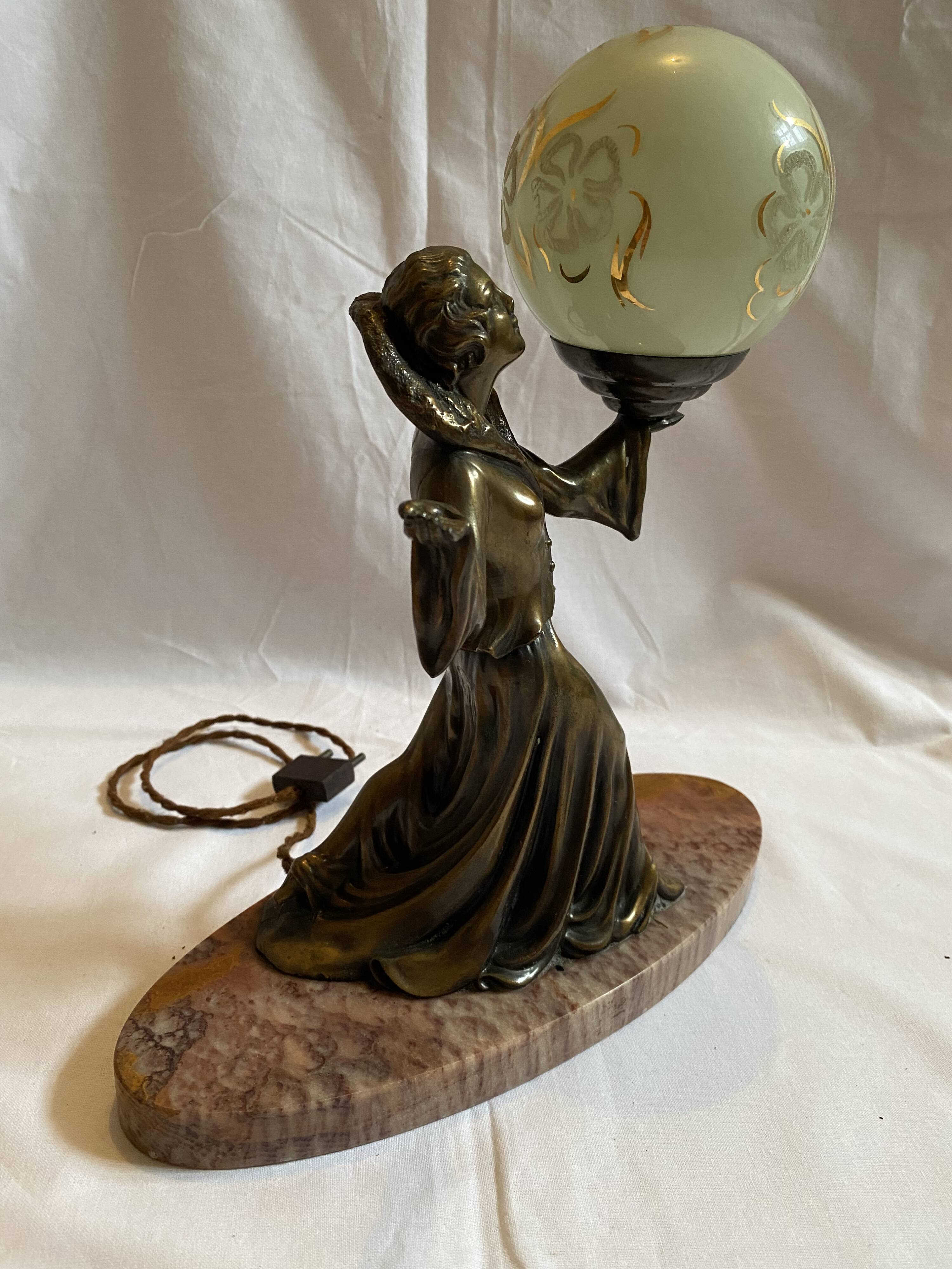 Art deco lamp in marble and bronze, woman holding a globe