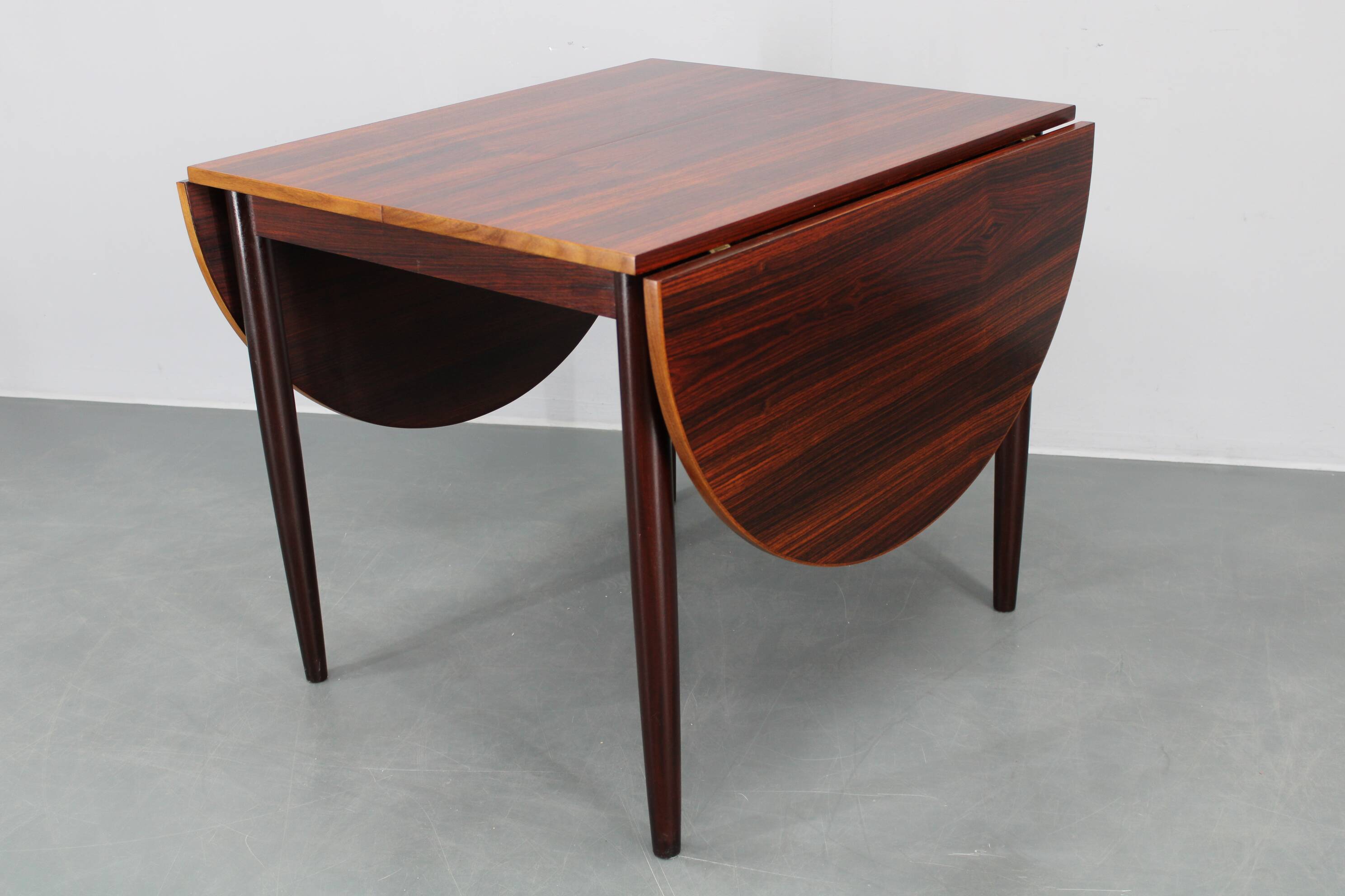 1960s Danish extendable palisander dining table, 4 leaves, restored