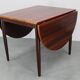1960s Danish extendable palisander dining table, 4 leaves, restored