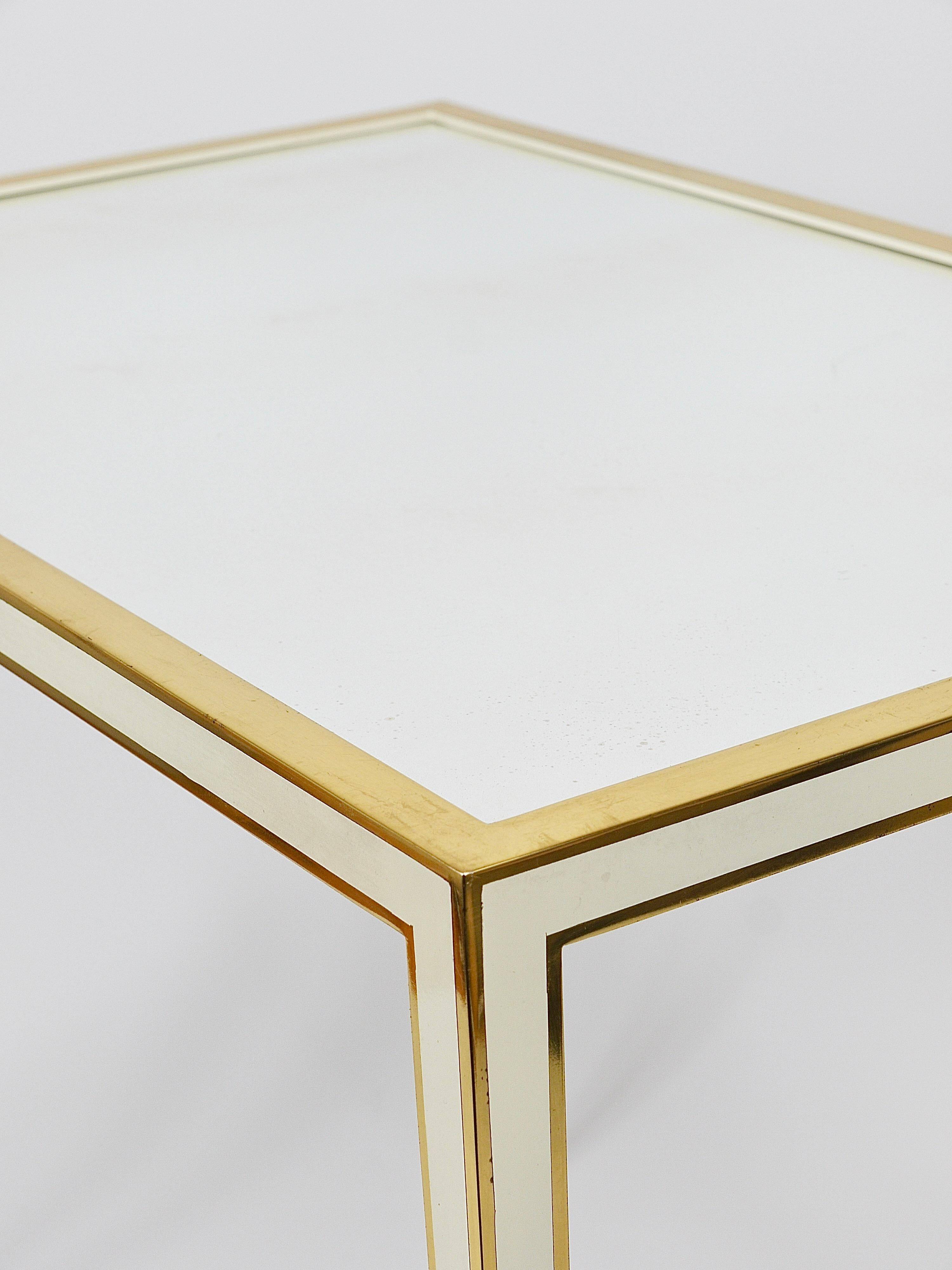 A pair of brass and white mirror tables from Vereinigte Werkstätten, Germany, 1970s.