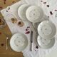 6 flat plates, antique porcelain with flowers and gilding, P L Limoges.