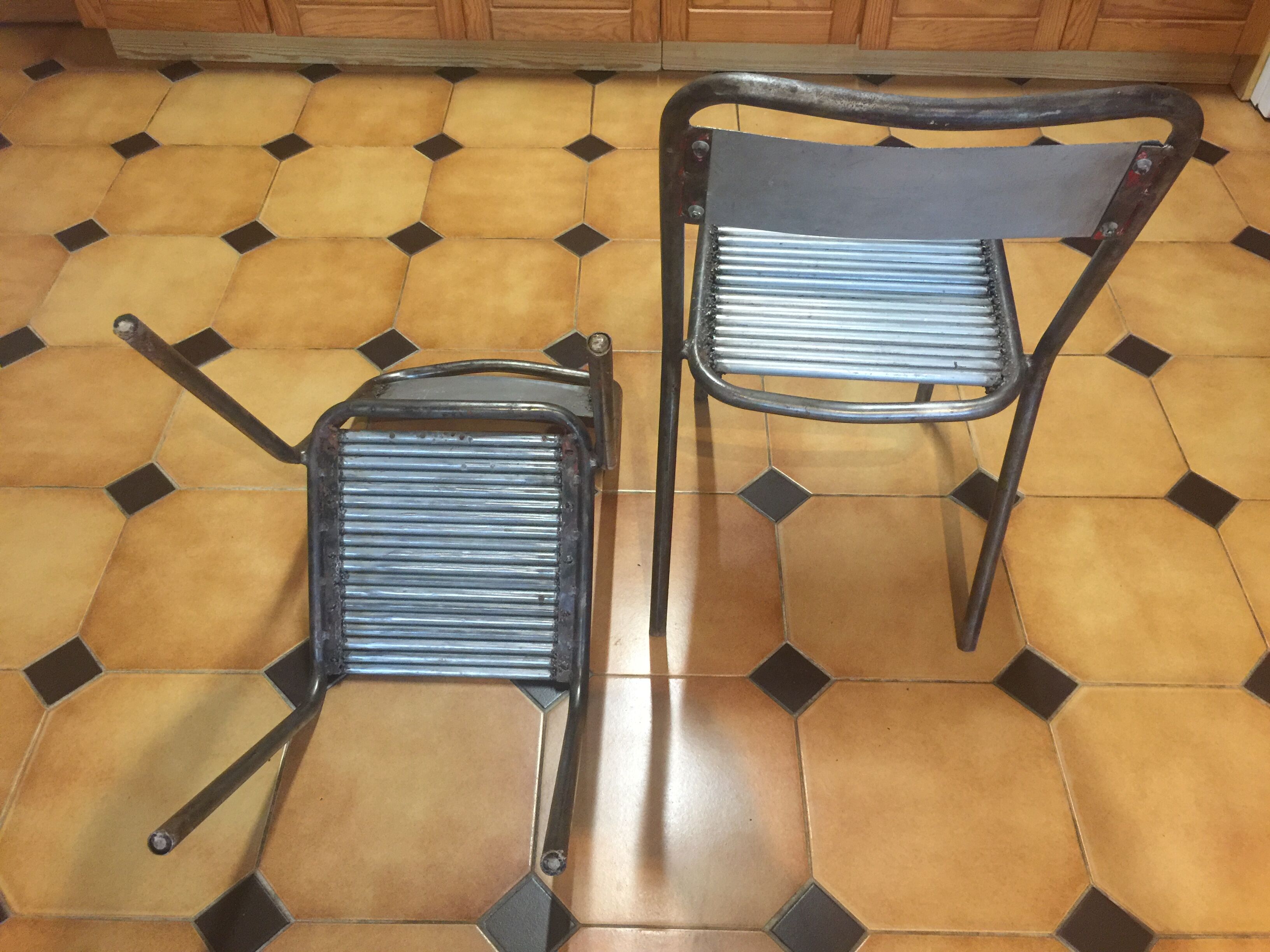 Pair of metal chairs