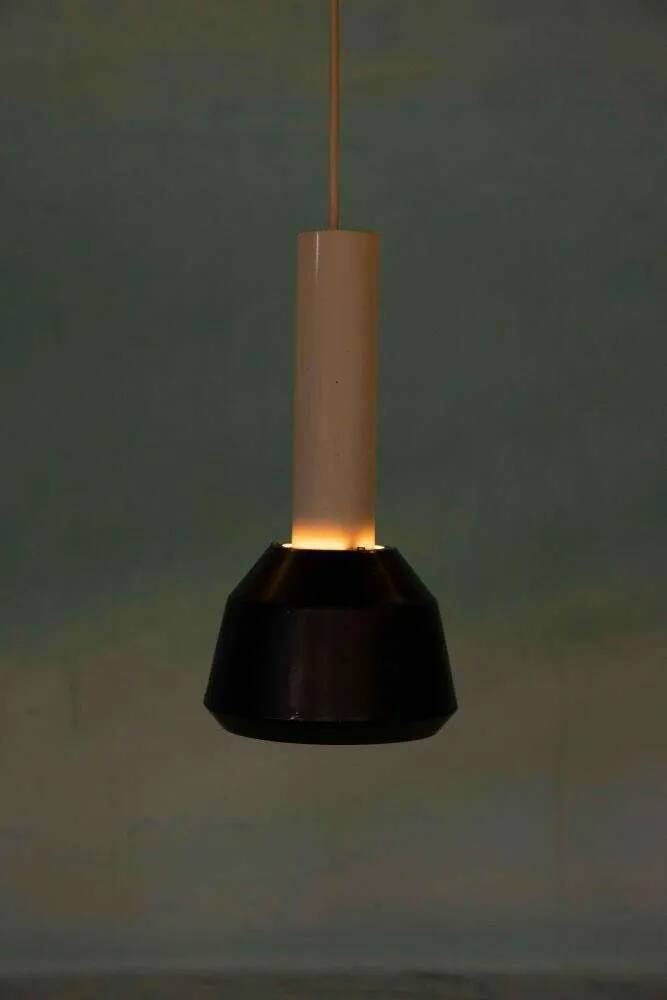 Vintage pendant light design, retro black and white ambient lamp.