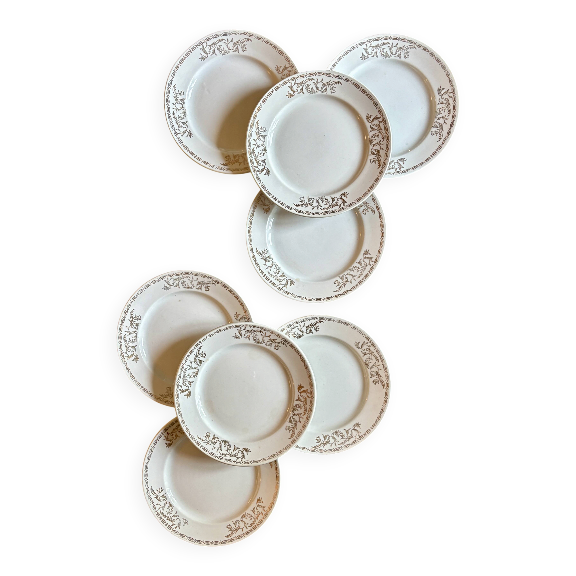 Set of 8 vintage white and gold dessert plates.