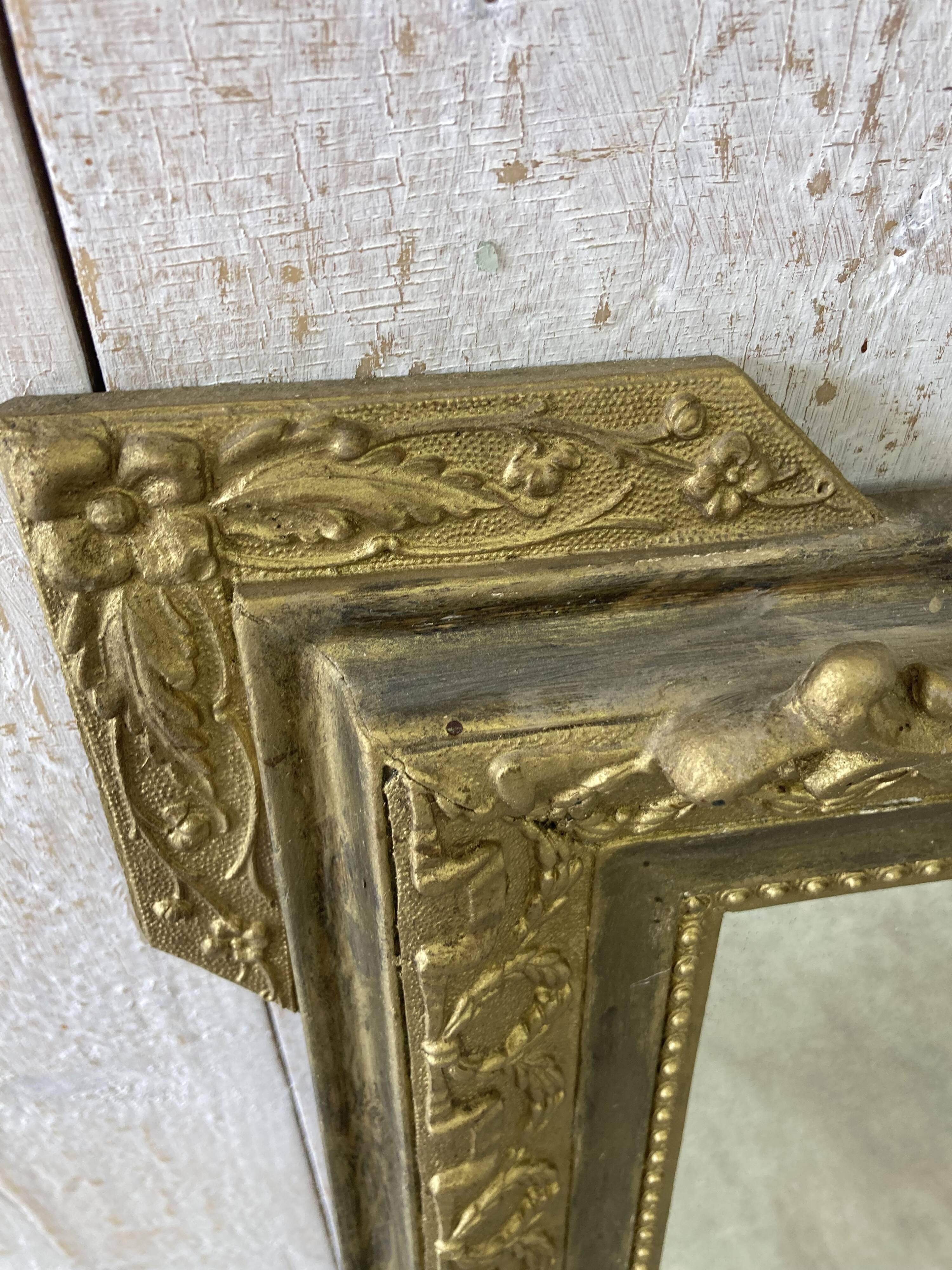 Antique mirror with a pediment