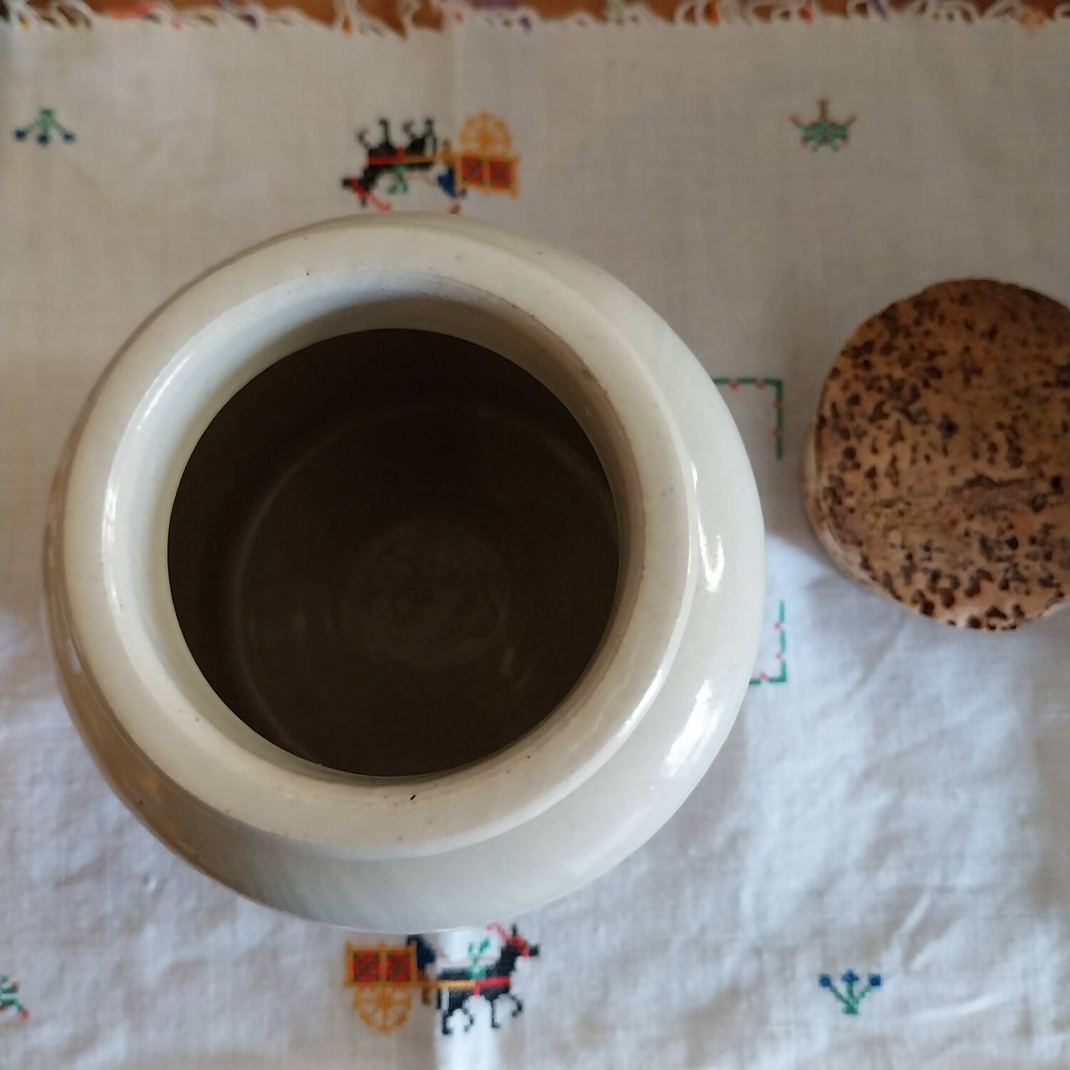 Old beige glazed stoneware pot