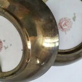 Pair of vintage Chinese decorative plates with floral decoration on a yellow background