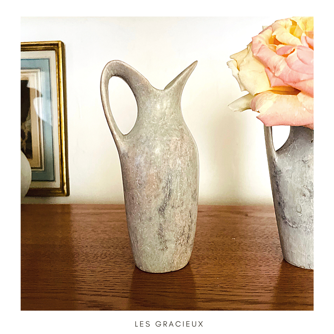 2 jugs in rough cut stone